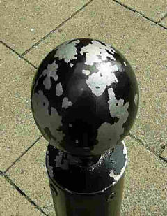 ball with chipped paintwork
