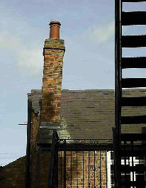 leaning chimney stack