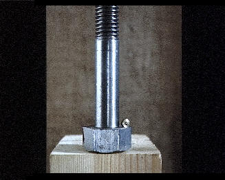 A big bolt and a small nut